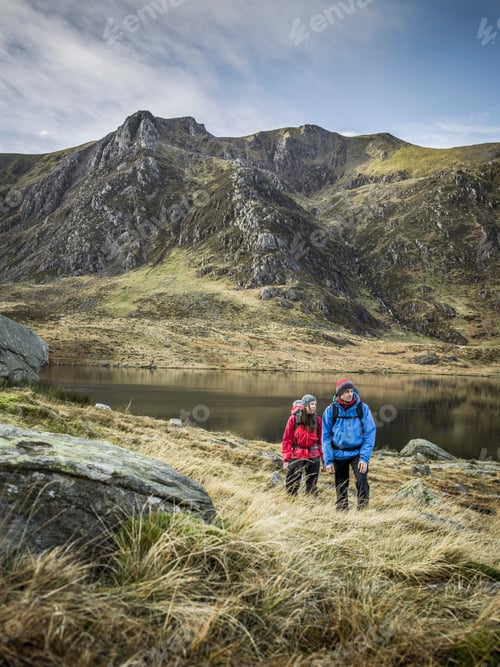 Preview: Couple hiking in rocky landscape