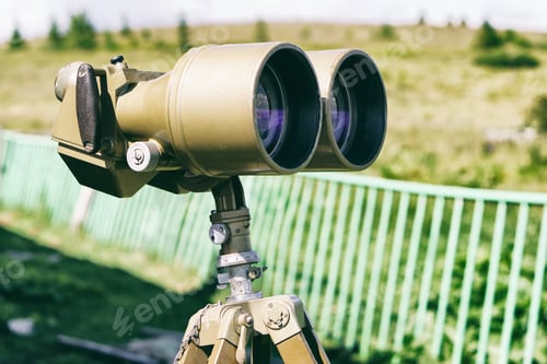 Preview: Old green military binoculars.