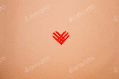 Preview: Red paper heart on beige paper background. Giving Tuesday,