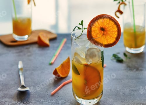 Preview: Photo of fresh orange juice in the glass jar. Summer healthy organic drink concept