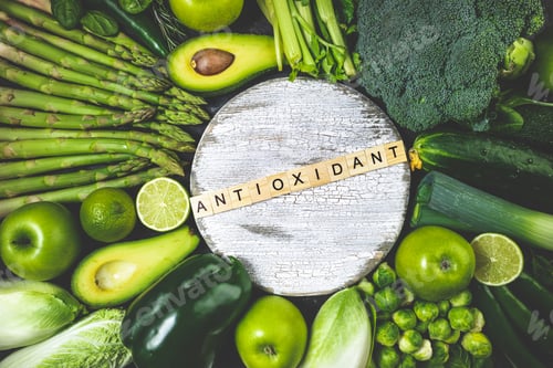 Preview: Healthy food clean eating green vegetables and fruits on dark stone background