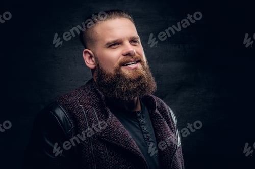 Preview: Portrait of bearded male on grey vignette background.