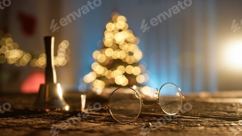 Preview: Santas Eyeglasses On Wooden Table In Front Of Christmas Tree