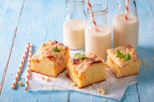 Preview: Tasty and sweet peach cake served with milk.