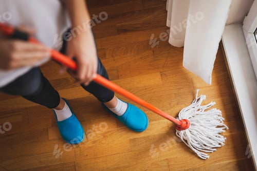 Preview: Woman cleaning the floor
