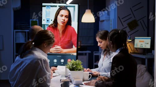 Preview: Workaholics overworked multi-ethnic businesspeople discussing with remote manager during online