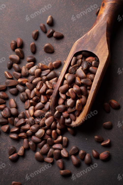Preview: Pine nuts on stone table