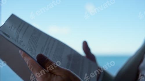 Preview: Professional hands flipping reading contract. Unknown lawyer study papers