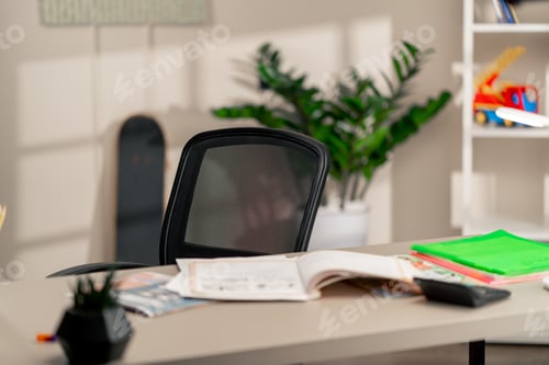 Preview: in the children's bright room there is table and a chair, everything for studying, on the table