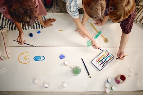 Preview: Generation Alpha Children Collaborating While Painting Together