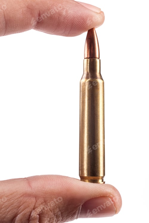 Preview: Fingers Holding Bullet