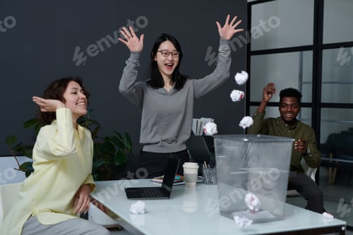 Preview: Business people fooling around in office