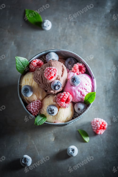Preview: Cold ice cream with blueberries and raspberries