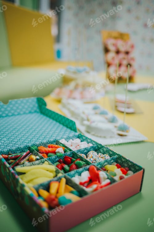 Preview: Vertical shot of a box with colorful candies