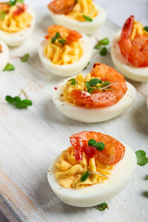Preview: Boiled eggs stuffed with yolk and seasoned with mayonnaise, stuffed eggs with shrimp,