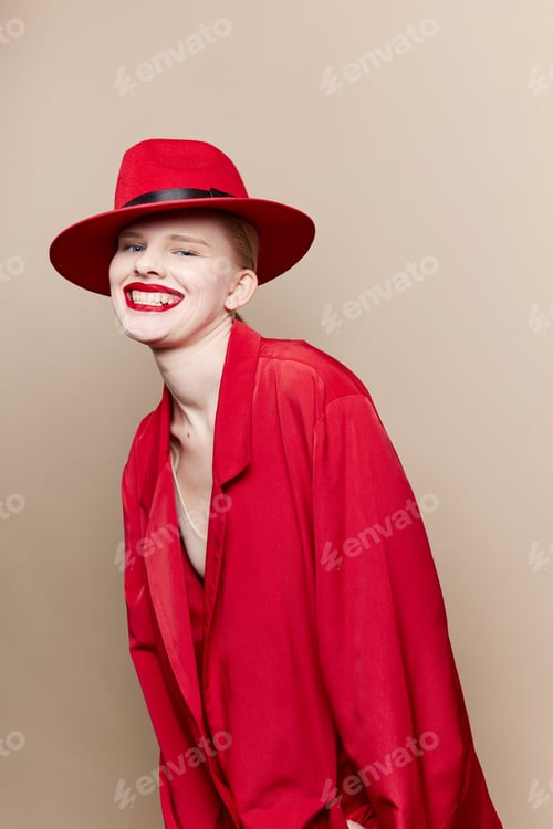 Preview: fashionable woman red jacket and hat red lips fashion beige background