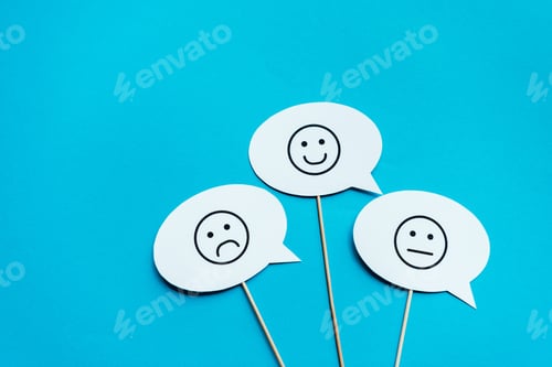 Preview: KYIV, UKRAINE - AUGUST 5, 2019: set with emoticons on white speech bubbles and sticks on blue