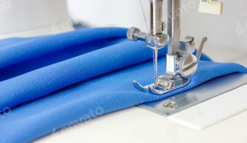 Preview: sewing machine with fabric. clothing making concept