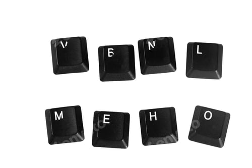 Preview: Black keyboard keys arranged to form words on a white surface during daylight hours