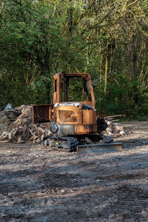 Preview: Burnt out construction digger by thieves.