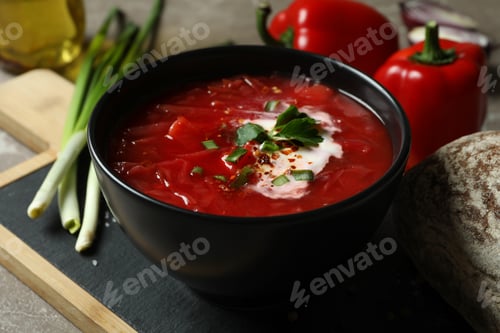 Preview: Concept of tasty eating with borscht on gray background