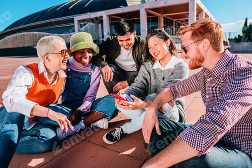 Preview: Young group multiracial friends reunion sitting together having fun and smiling.