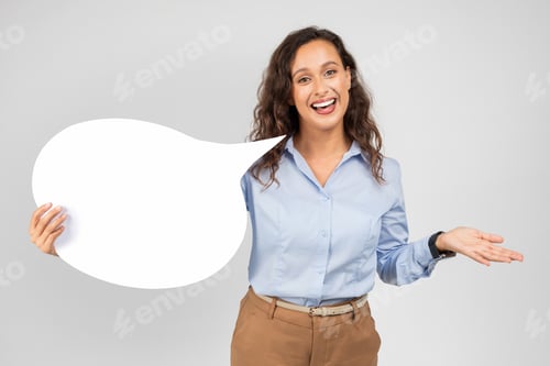 Preview: Positive caucasian young lady in formal wear hold abstract cloud for thoughts, text