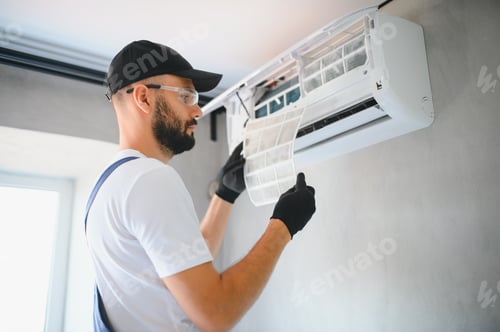 Preview: Male technicians service for repair and maintenance of air conditioners