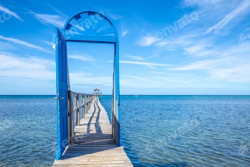 Preview: A blue door on the beach of Sandy Bay on the Roatan Island of the Caribbean Sea. Honduras