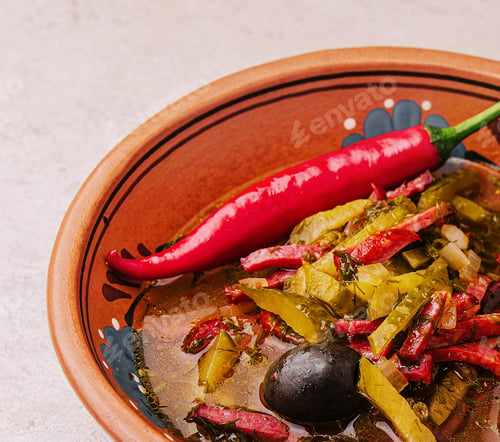 Preview: meat soup Solyanka in bowl close up