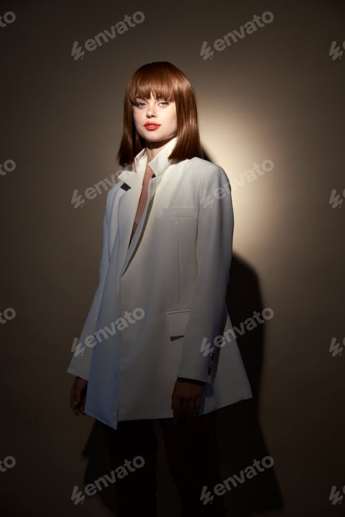 Preview: woman in evening wear pose for the camera isolated background
