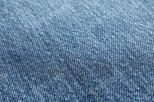 Preview: Texture of blue jeans as background, space for text