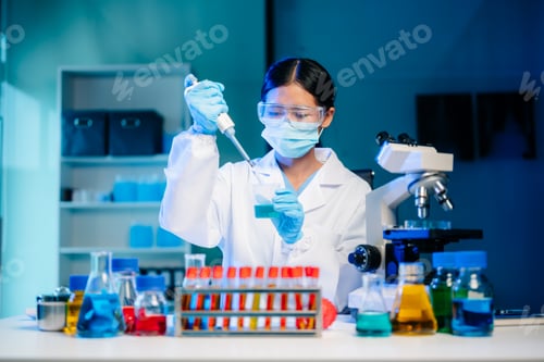 Preview: Biologist taking experiment with plants working in laboratory.