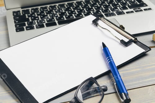 Preview: Clipboard with blank paper for copy space and supplies on wooden table