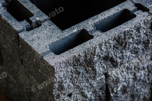 Preview: Charcoal black concrete paver with a rectangular hole, creates a sleek and modern appearance for any