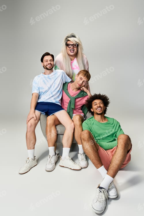 Preview: Vibrant group of queer friends showcasing pride and joy in a studio setting