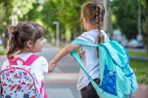 Preview: Back to school education concept with girl kids.