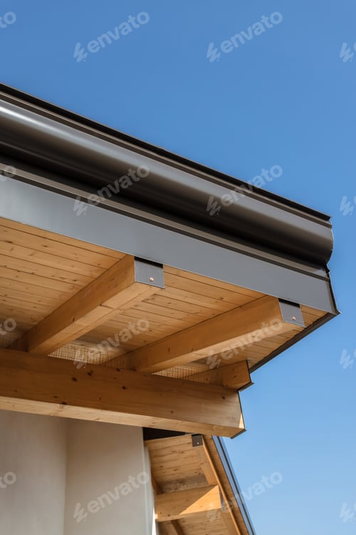Preview: New wooden warm ecological house roof with steel gutter rain system