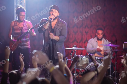 Preview: Male musicians performing at nightclub