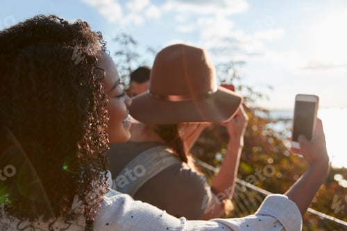 Preview: Group Of Tourists Taking Photos On Mobile Phones