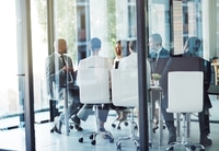 Preview: Professional Colleagues Engaged in Corporate Meeting