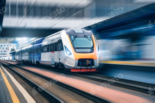 Preview: High speed train in motion on the railway station at sunset
