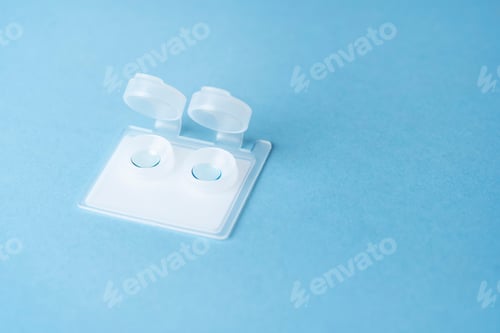 Preview: Contact lenses in a plastic container. Medical treatment of myopia, astigmatism