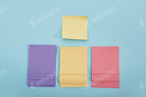 Preview: Colorful sticky notes on light blue background, flat lay