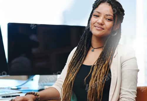 Preview: Cropped portrait of an attractive young woman sitting in her home office