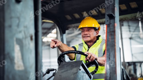 Preview: Industrious Engineer Operating Forklift in Warehouse. Efficient Forklift Driving in Factory.