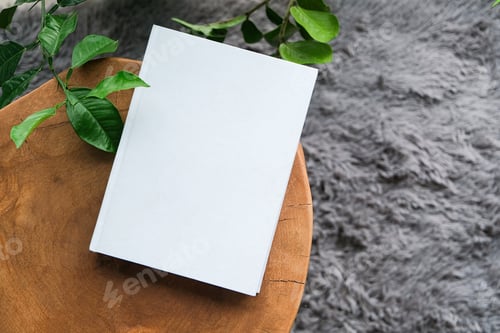 Preview: blank book mockup on decorative table with many green plants