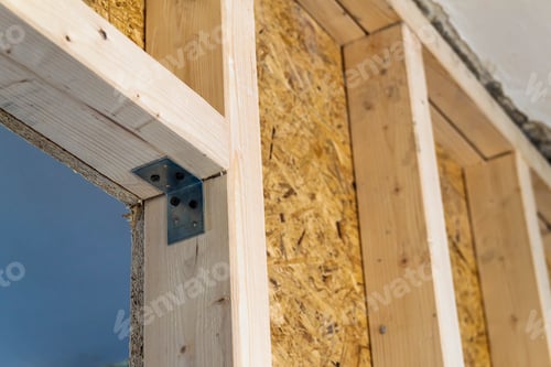 Preview: Close up detail of house construction wooden wall elements. Interior frame renovation work