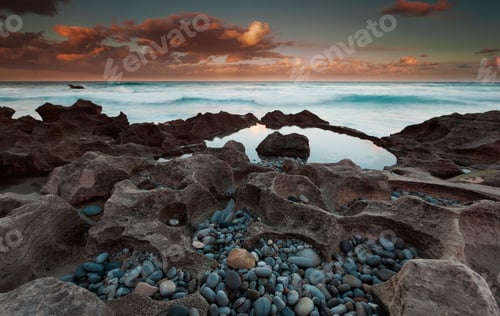 Preview: The coastline, bays and cliffs on Cape Agulhas near Arniston at sunset.