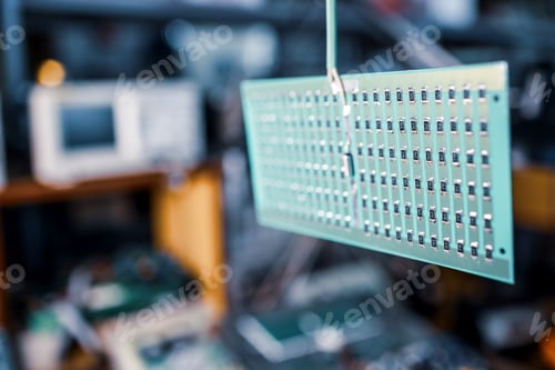 Preview: Close-up side view of a panel of SMD resistors